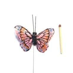 Lille pastelfarvet sommerfugl