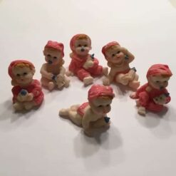 Lyserøde baby figurer