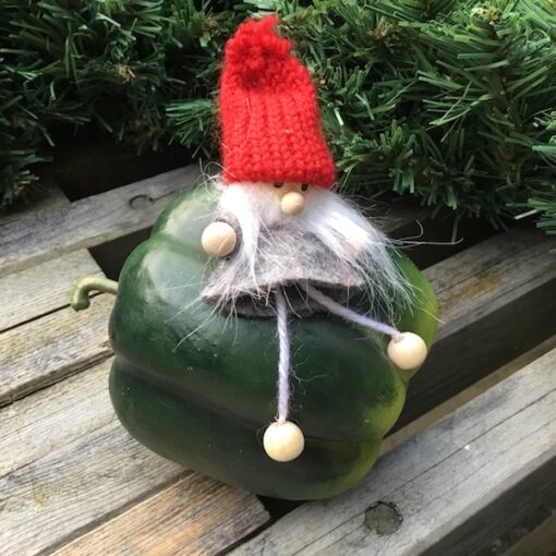 Dekorativ nisse på peberfrugt