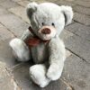 Dekorativ grå teddy bamse