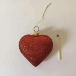 Alternative view of Rødt glimmer plastik hjerte 