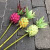 Kunstig pink ananas på pind