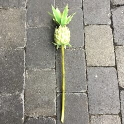 Kunstig gul ananas på pind