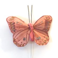 Gammelrosa sommerfugl med glimmerkant