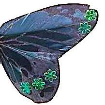 Mørkeblå sommerfugl med blomsterpynt