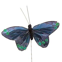 Mørkeblå sommerfugl med blomsterpynt