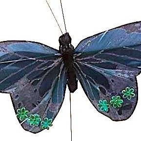 Mørkeblå sommerfugl med blomsterpynt