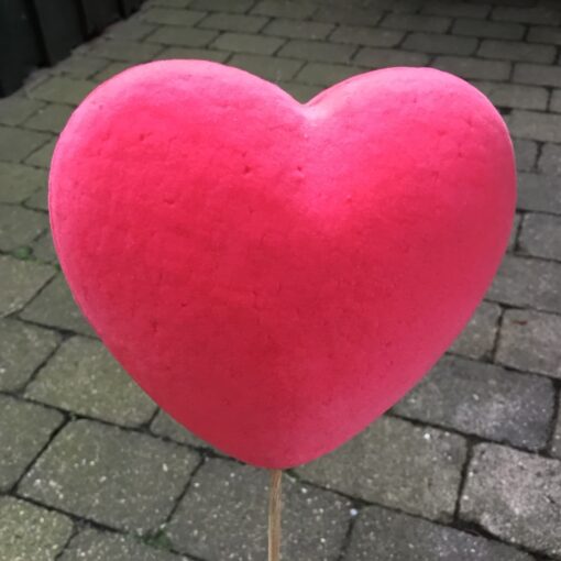 Lyserødt hjerte på pind