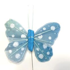 Lille lyseblå prikket sommerfugl