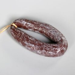 Kunstig rund rød spegepølse