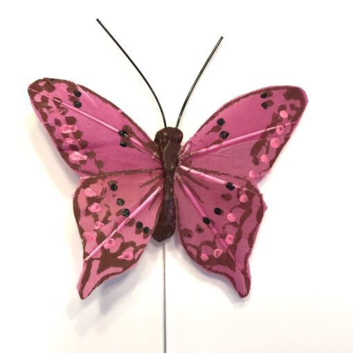 Pink lille plettet sommerfugl