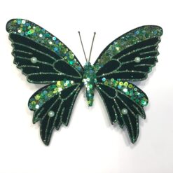 Grøn sommerfugl med perler